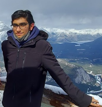 Jane leaning against a bus